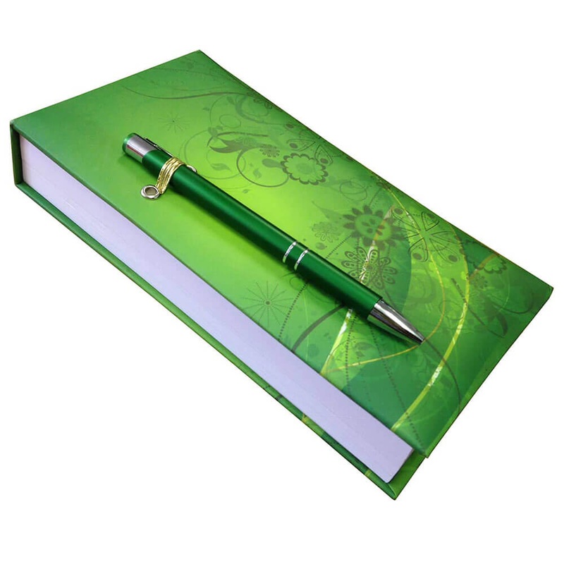 Bloc-notes de motif vert avec stylo