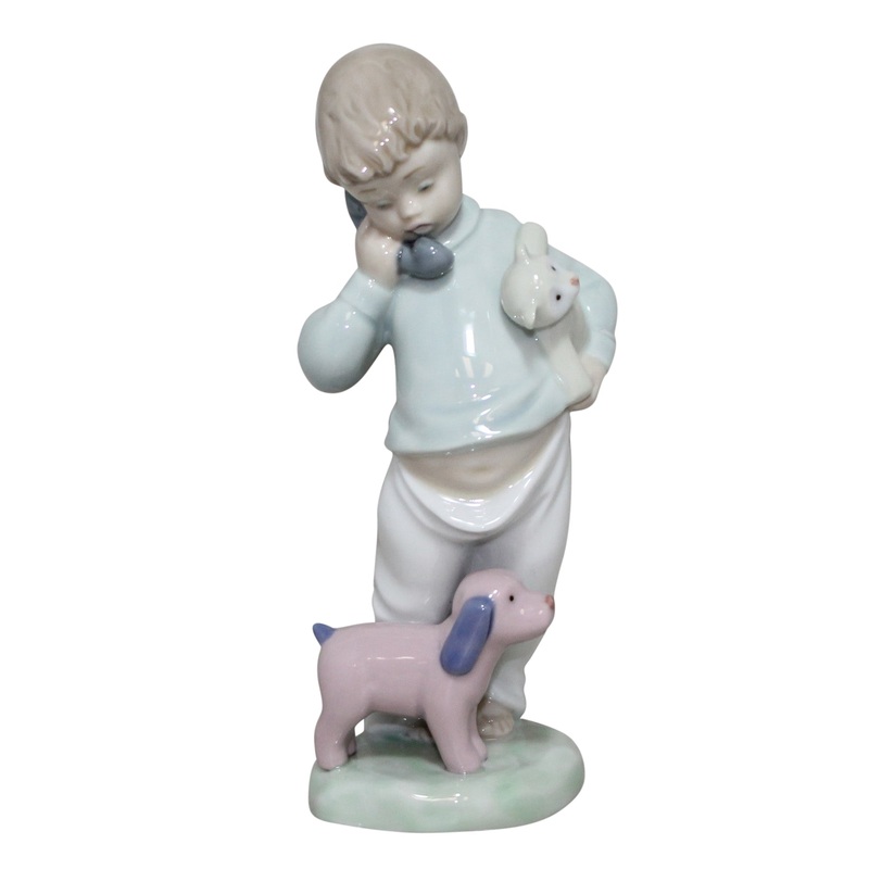 Lladr Figurine: Nao 1044 Boy on Phone with Pupets
